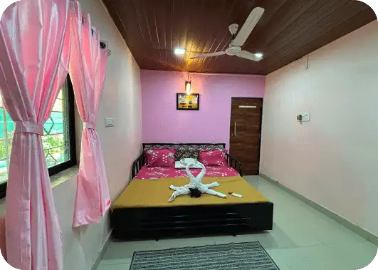 Pool view of a beautifully designed bedroom in Govind Villa, featuring modern furnishings.