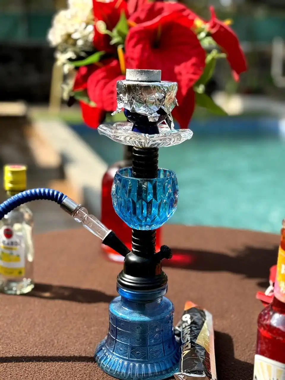 Stylish hookah setup by the poolside at Govind Villa